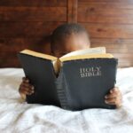 a child reading the bible